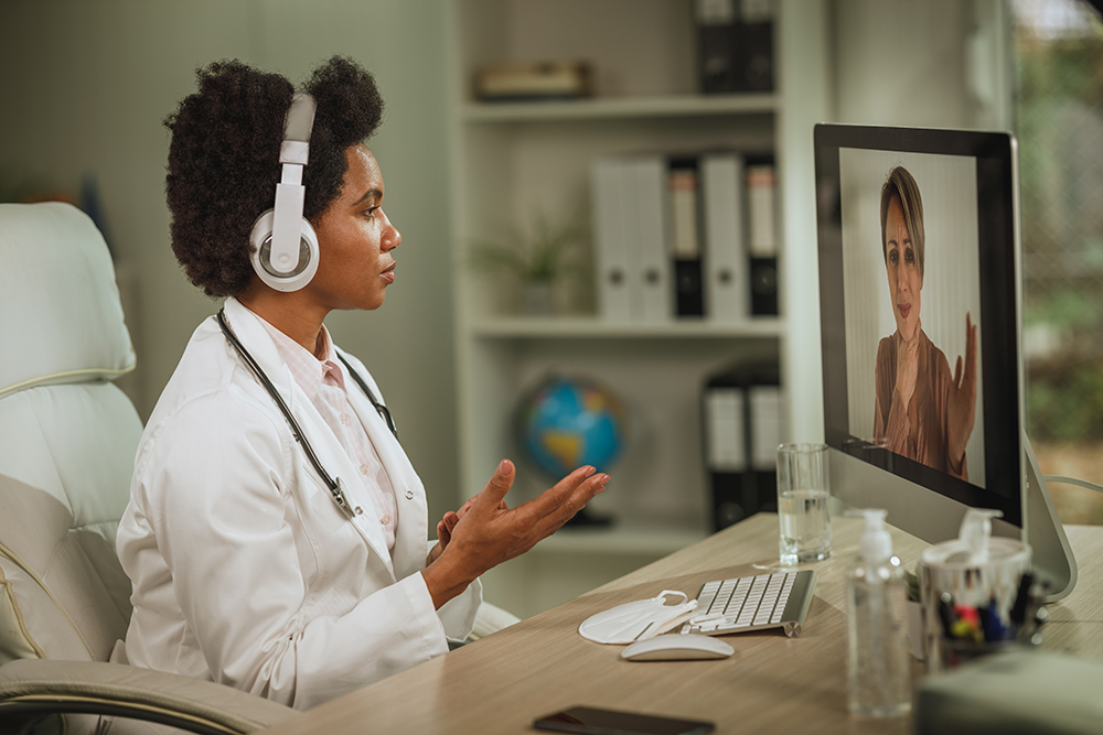 a provider on a telehealth visit with a patient